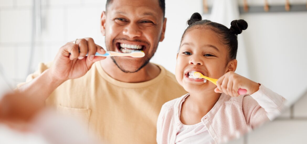 father and daughter practicing proactive dental care in white plains